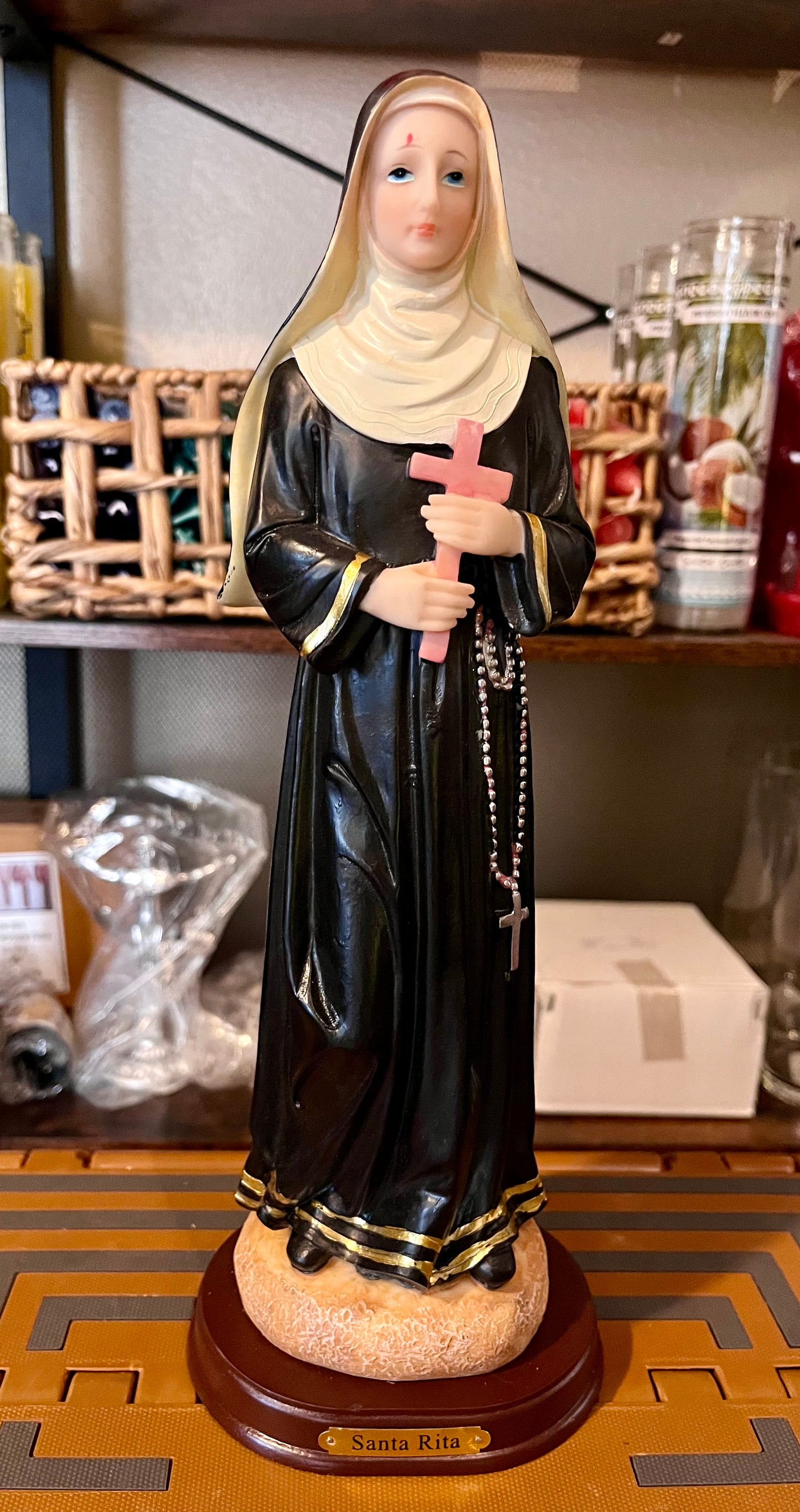 Santa Rita resin statue 12"